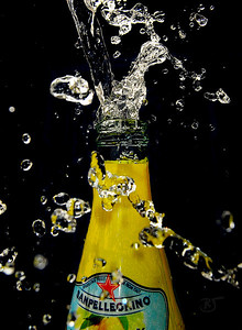  > Day 362 - Lemonata

The only soft drink I like to treat myself to every now and then.  


Setup:  Blue dishpan behind the bottle, fill the bottle with water then use a pitcher to pour into the spout.  Make sure the pitcher is white or clear, it will cast colors.  Its in an aluminum sink, so that adds as a foil reflector on all three sides and bottom.  Out cabinets and backsplash are white, so I bounce the flash off the backsplash and underside of the cabinets to add light from above.  I use a 1/8 flash setting and position the flash about the start of the dish pan - just beyond the edge (towards the back splash), this way the flash wont light the dish pan but will bounce the light very well.  You won't get any glare either, but you never know what water droplets will reflect. Keep a towel handy for around the sink, yourself, and any spray back onto the lens (it happens, so don't get too close). Then take about 200 photos.  :)




Apr 06 2009